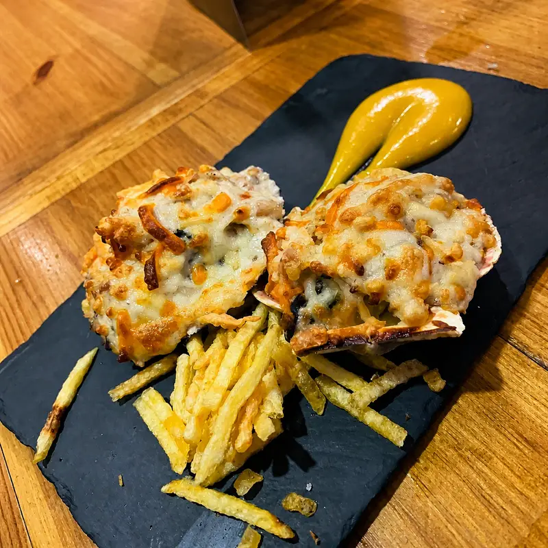 Tosta gratinada de espinacas en Real 31 Almería